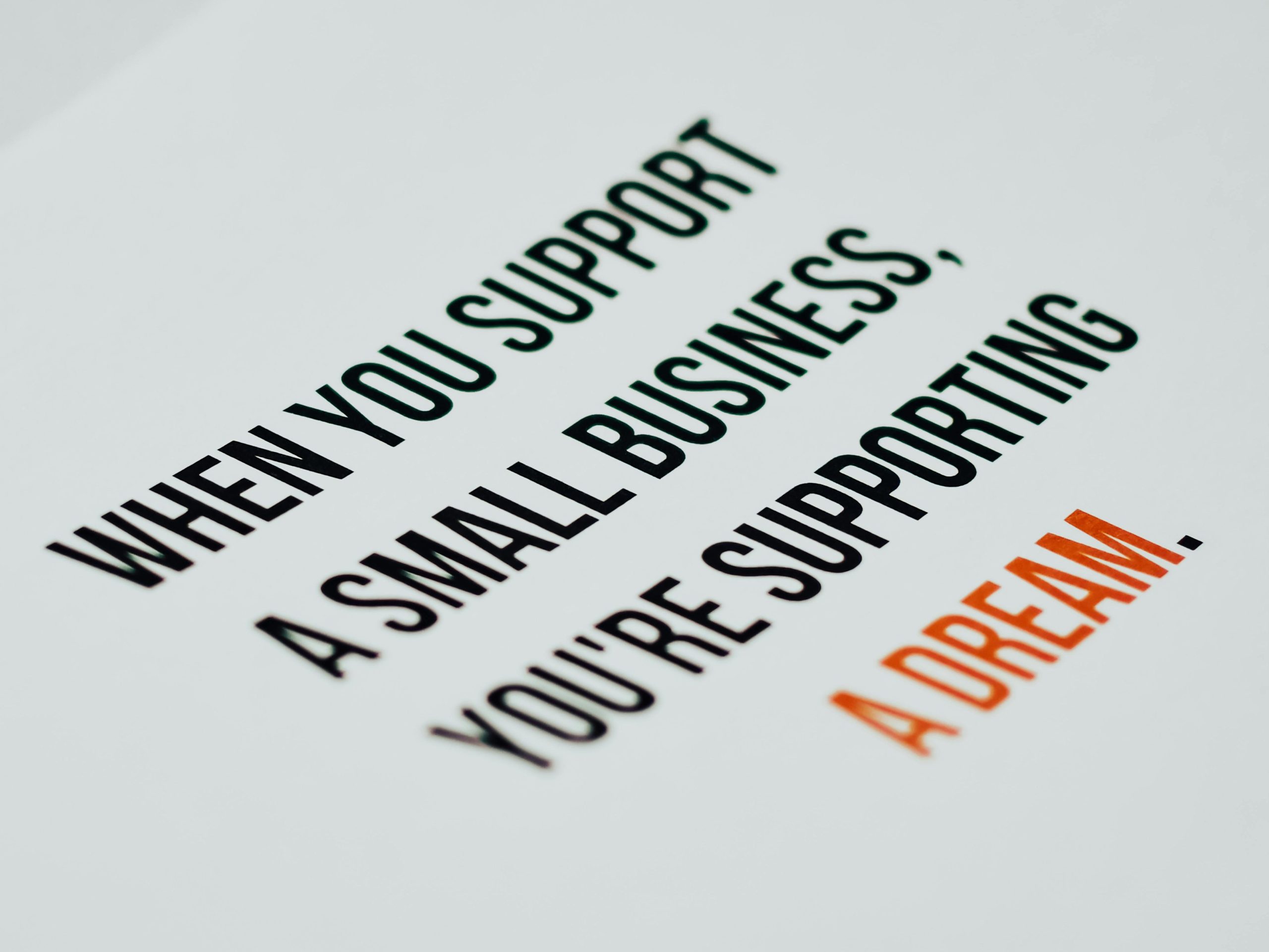 Motivational quote about supporting small businesses, encouraging entrepreneurship and dreams.